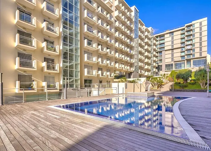 Blue Sky With Pool By Madeira